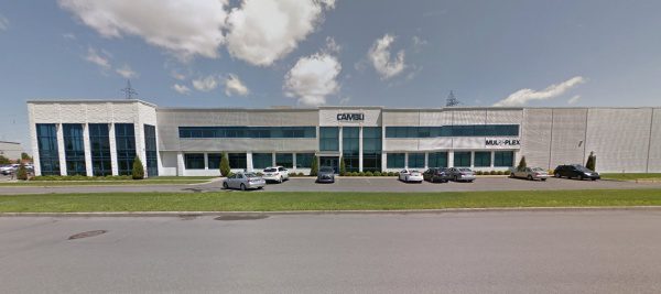 view of office and industrial building from across the street.